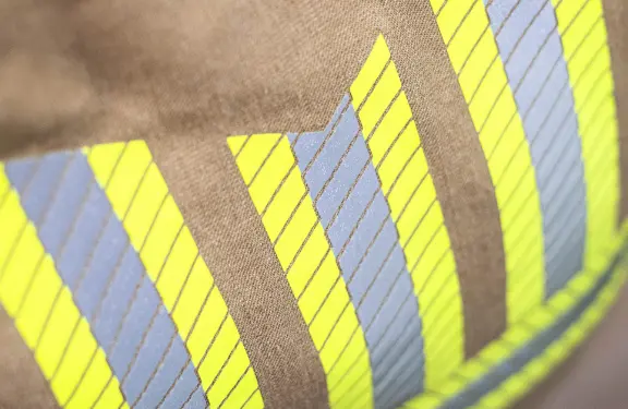 Taped Yellow and silver reflective perforated tapes.