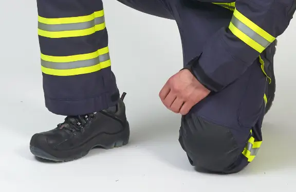 Ergonomically arched knee part with reinforcement and the possibility of inserting a knee pad